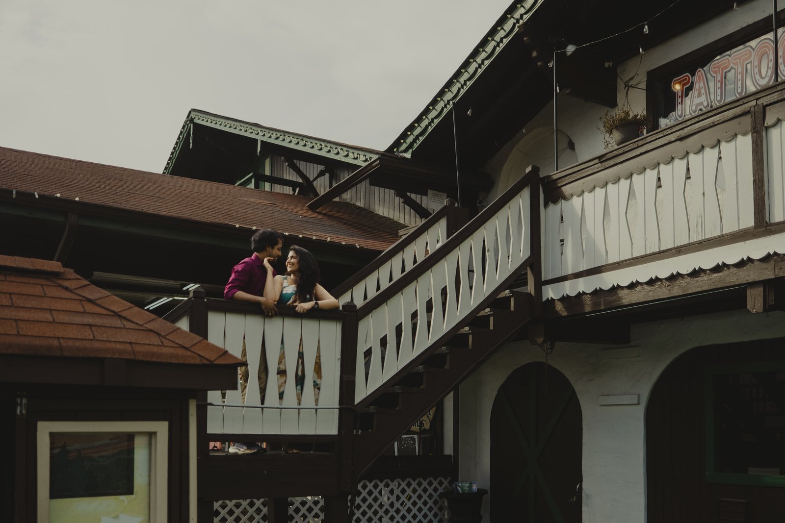 James and Srinidhi together on a rooftop balcony